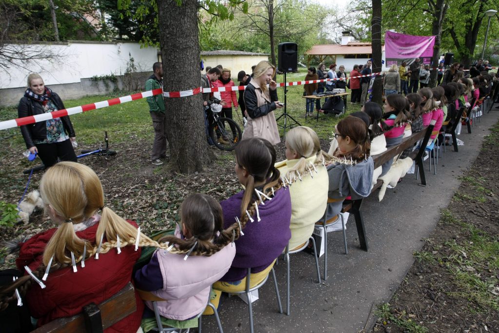 Hungarian Hairdresser Sets Record For The World’s Longest Intewoven  Hair Braid post's picture