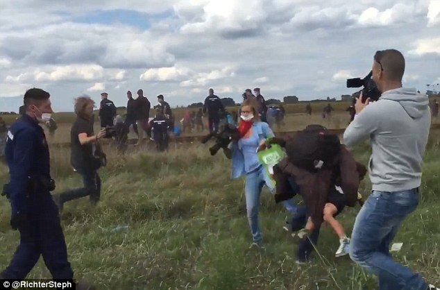 Immigration Crisis: Hungarian Camerawoman Sparks Outrage By Deliberately Tripping Fleeing Syrian Migrants – Video! post's picture
