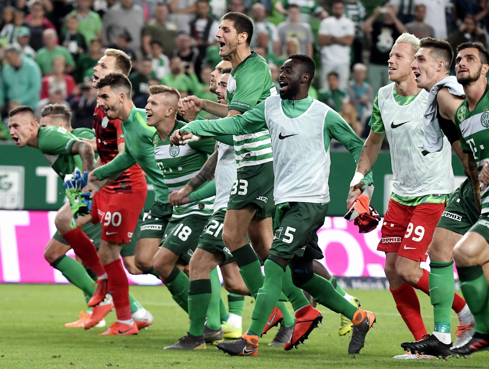 Teammates of Ferencvarosi TC celebrate after the UEFA Europa