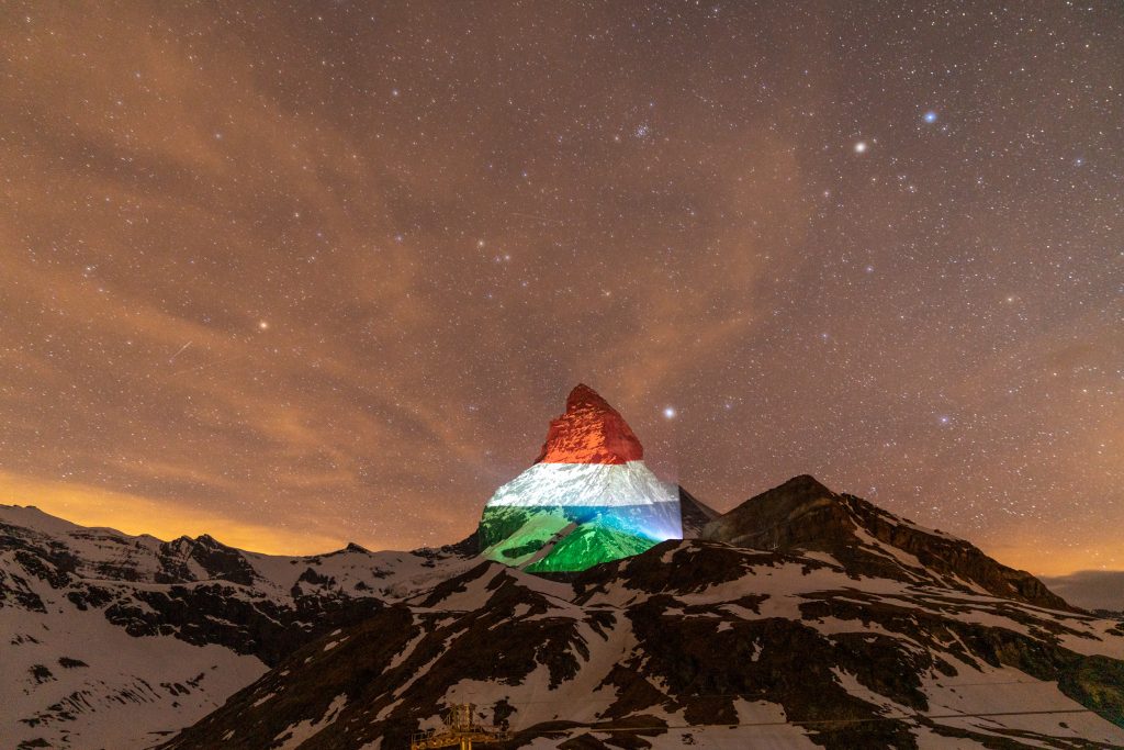 Most Photographed Peak of Alps Illuminated in Hungarian Colors post's picture
