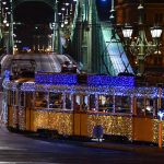 Tram and Local Train in Budapest Decorated with Christmas Lights