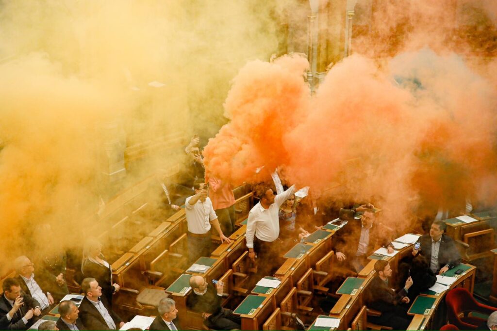 Opposition Politicians Throw Tantrum in Parliament with Smoke Flares over Pride Ban post's picture